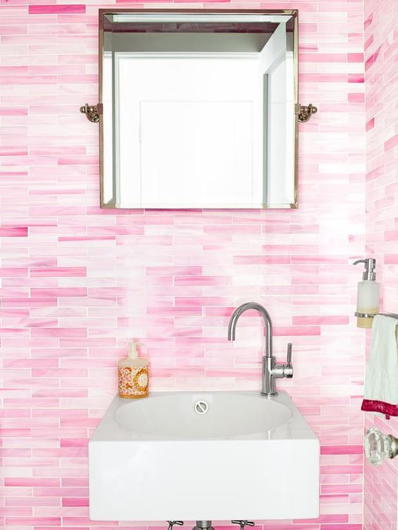 Pink ombre tiles in a bathroom