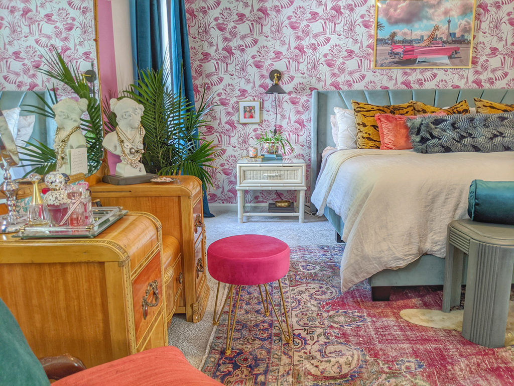 Amber Shirley's bold master bedroom design featuring Frolic Magenta Lagoon wallpaper